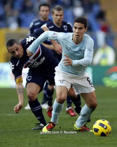 Lazio players cheer after scoring during the Italian Serie A